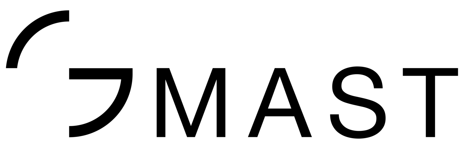 Black bold capitalised text reads 'GMAST'. The G has had pieces taken out of it, leaving just a few curved lines.
